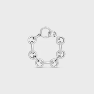 Pulsera gruesa Heritage con dijes en latón con acabado de rodio