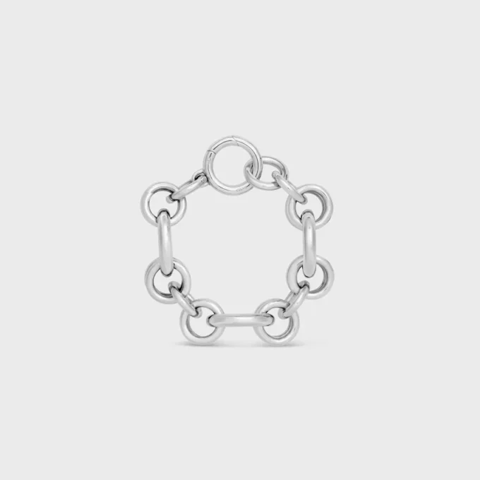 Pulsera gruesa Heritage con dijes en latón con acabado de rodio Pulsera gruesa Heritage con dijes en latón con acabado de rodio