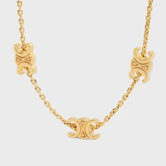 Pulsera Triomphe Mini Triomphe en latón con acabado dorado