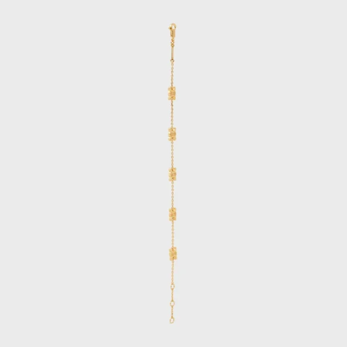 Pulsera Triomphe Mini Triomphe en latón con acabado dorado Pulsera Triomphe Mini Triomphe en latón con acabado dorado