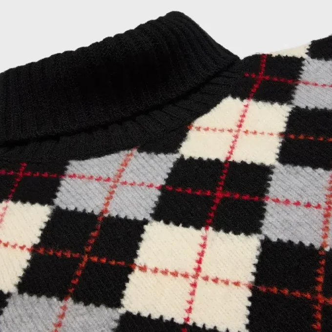 Suéter de cuello alto en lana con diseño Argyle Suéter de cuello alto en lana con diseño Argyle