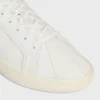 Zapatillas con cordones CELINE Lou Low con el logotipo Triomphe en lona y piel de becerro Zapatillas con cordones CELINE Lou Low con el logotipo Triomphe en lona y piel de becerro