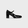Zapatos CELINE Lily Perforated Triomphe Babies en piel de becerro charol Zapatos CELINE Lily Perforated Triomphe Babies en piel de becerro charol
