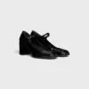Zapatos CELINE Lily Perforated Triomphe Babies en piel de becerro charol Zapatos CELINE Lily Perforated Triomphe Babies en piel de becerro charol